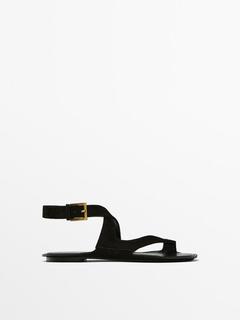 Split suede flat sandals offers at $169 in Massimo Dutti