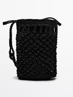 Nappa leather woven bucket bag offers at $399 in Massimo Dutti