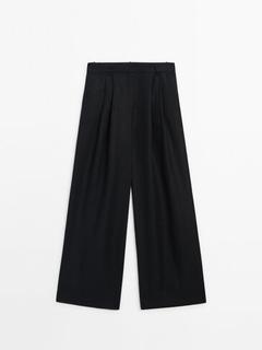 Straight fit double dart trousers offers at $169 in Massimo Dutti