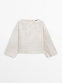 Creased-effect printed blouse offers at $129 in Massimo Dutti