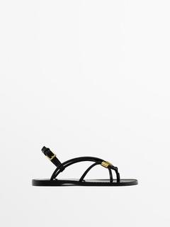 Strappy sandals with metal detail offers at $169 in Massimo Dutti