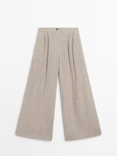 100% linen waffle-knit wide-leg trousers offers at $169 in Massimo Dutti