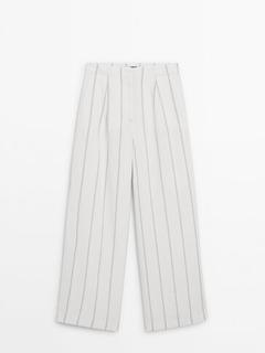 Wide-leg striped trousers offers at $169 in Massimo Dutti