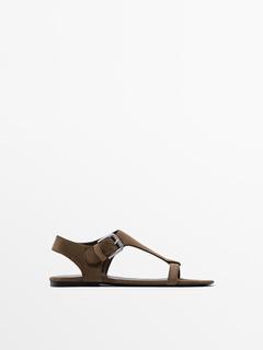Flat split leather sandals with buckle offers at $169 in Massimo Dutti
