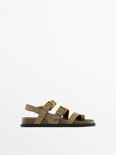 Flat sandals with buckles offers at $199 in Massimo Dutti