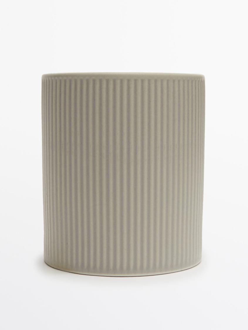 Oat & White Flowers scented candle (280 g) offers at $55.9 in Massimo Dutti