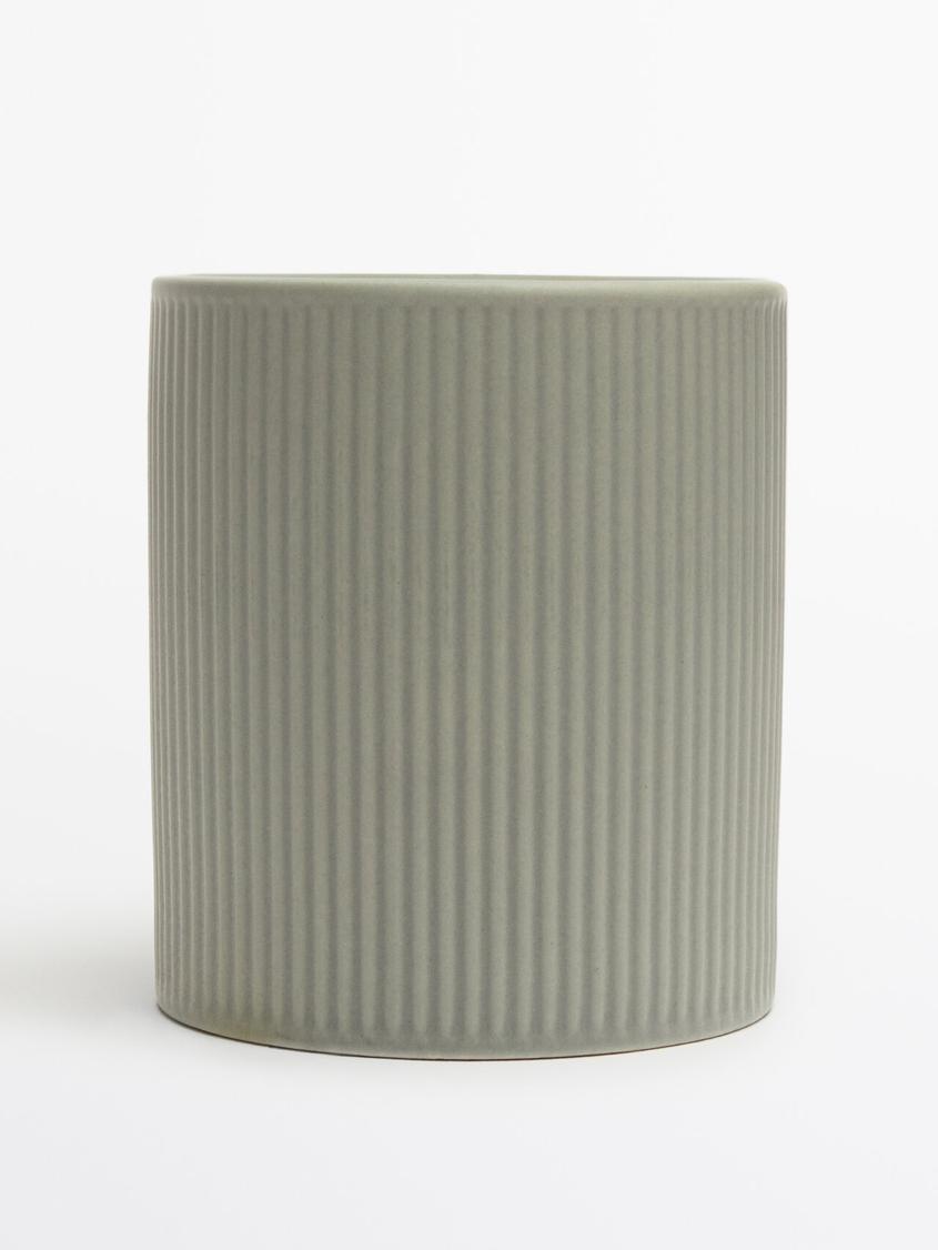 Wild Sage & Basil scented candle (280 g) offers at $55.9 in Massimo Dutti
