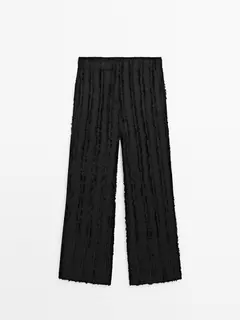 Trousers with fringe detail offers at $169 in Massimo Dutti