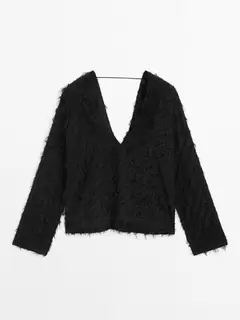 V-neck blouse with fringe detail offers at $149 in Massimo Dutti